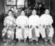 Singapore / Malaysia: Four young Peranakan women, Singapore, c. 1910